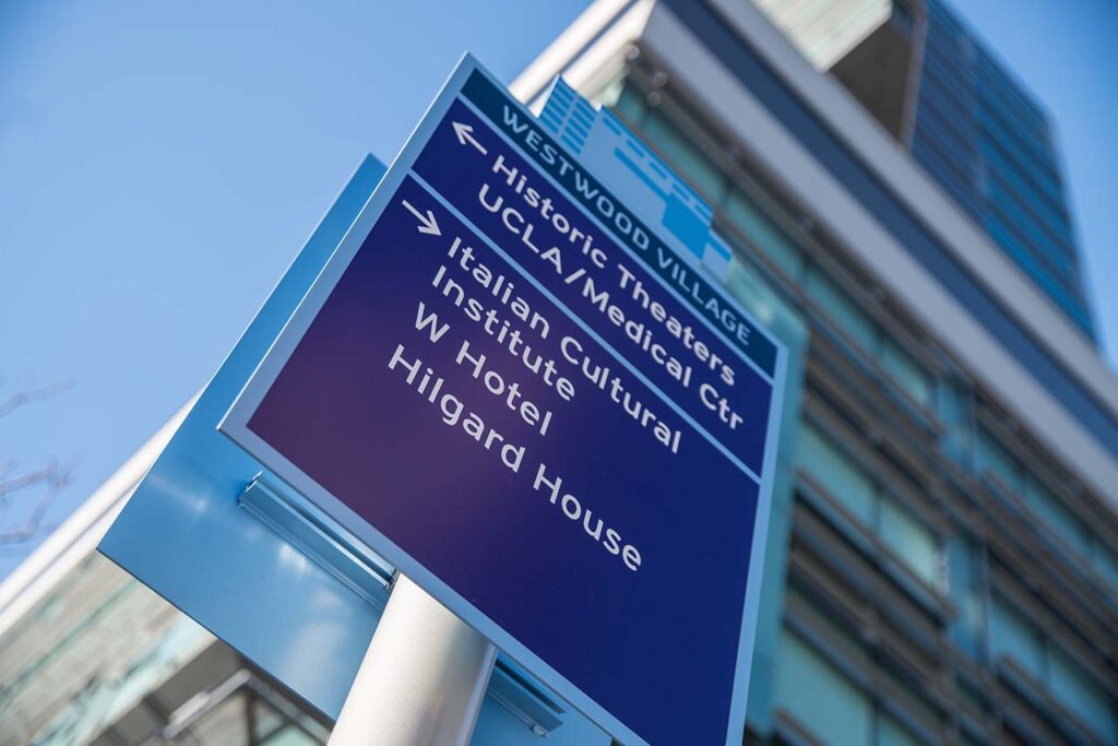 Westwood Village signage with directions to Historic Theaters, UCLA/Medical Center, Italian Cultural Institute, W Hotel and Hilgard House