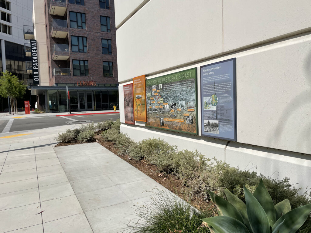 Outdoor porcelain enamel exhibit addressing Pasadena's past on the streets of Old Pasadena
